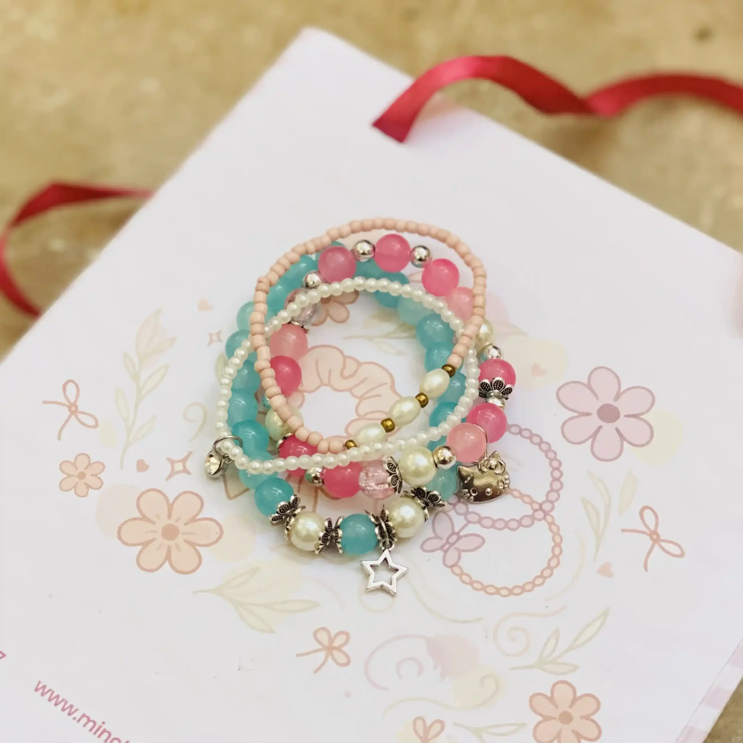 IMG_2497_4_11zon Hello Kitty Bracelet Stack - Pink & Seagreen - Image 1
